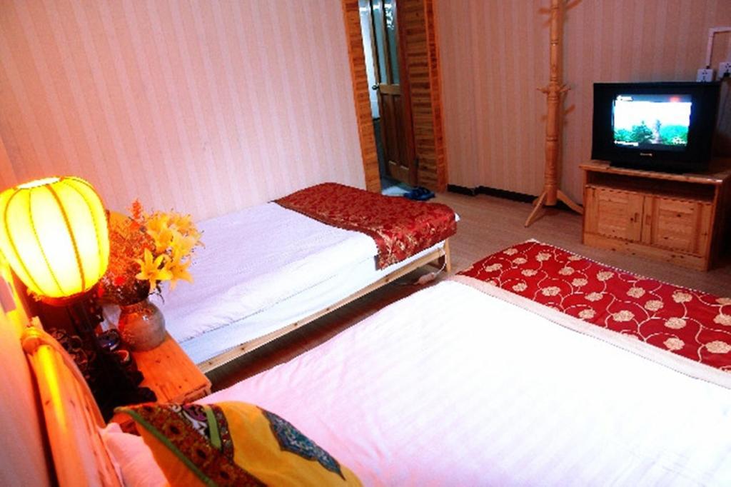 Yunxi Inn Лицзян Номер фото